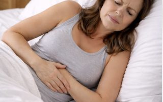 Womain in pain after vaginal tightening