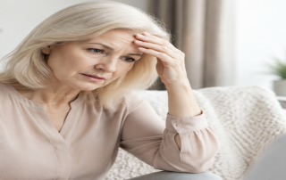 Woman discussing clitoral hood surgery and clitoropexy during a medical consultation