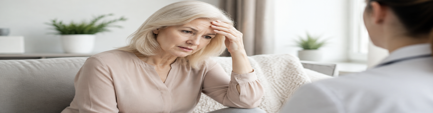 Woman discussing clitoral hood surgery and clitoropexy during a medical consultation