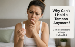 Woman wondering why her tampon keeps falling out due to possible pelvic organ prolapse or vaginal laxity.